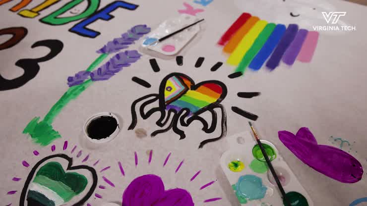 Students express themselves through Pride Week mural
