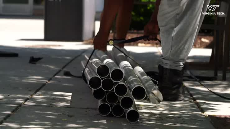 Installing tents to give Hokies more space on campus